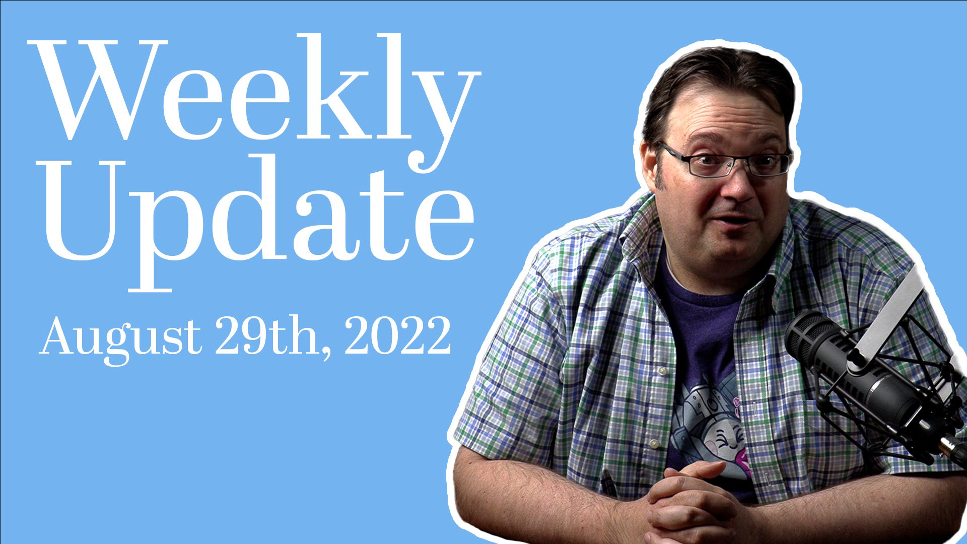 Brandon Sanderson sitting near a mic, recording the Weekly Update for August 29 2022